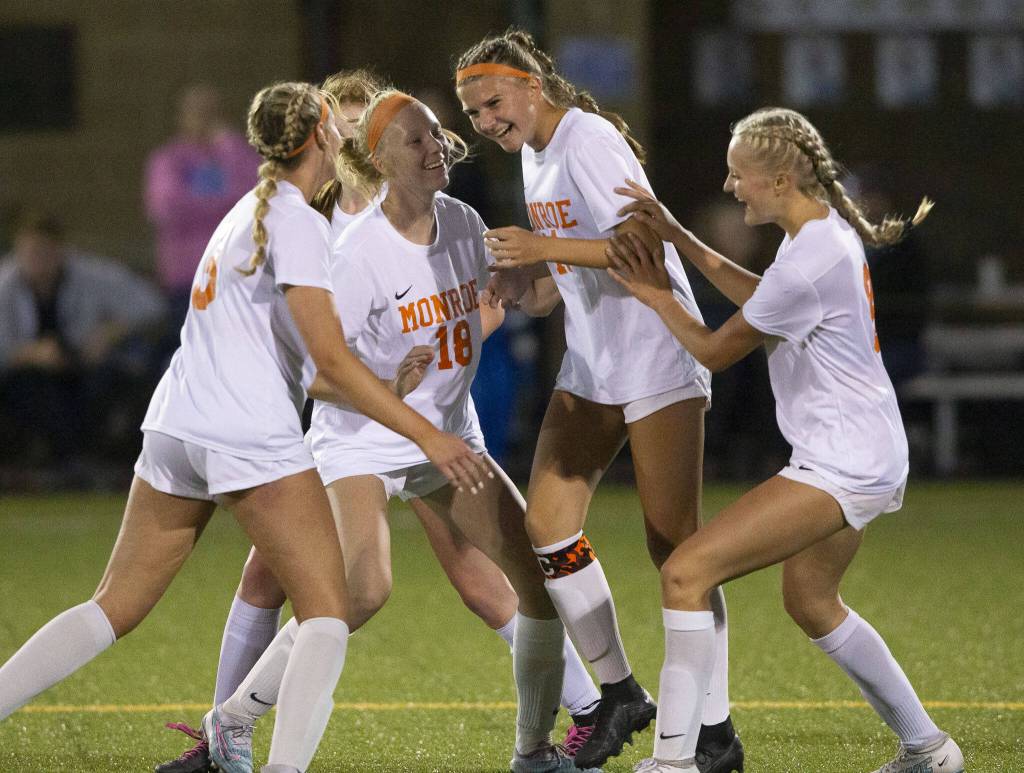 Monroes Sydney Garner celebrates her second goal with her teammates during the game Everett on Thursday, Sept. 7, 2023 in Everett, Washington. (Olivia Vanni / The Herald)