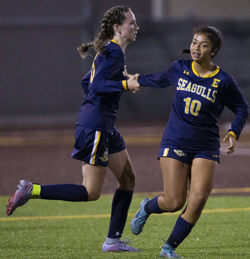 Everetts Avery Marsall is high-fived by teammate Genesis Molina Escobar after scoring a goal during the game against Monroe on Thursday, Sept. 7, 2023 in Everett, Washington. (Olivia Vanni / The Herald)