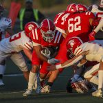 Marysville Pilchucks Kenai Sinaphet (21) moves with the ball during a football game between Marysville Pilchuck and Stanwood at Marysville Pilchuck High School in Marysville, Washington on Friday, Sept. 8, 2023. Marysville Pilchuck takes the win, 36-7. (Annie Barker / The Herald)