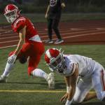 Marysville Pilchucks Maksim Tchelouchkin (8) reacts to a call during a football game between Marysville Pilchuck and Stanwood at Marysville Pilchuck High School in Marysville, Washington on Friday, Sept. 8, 2023. Marysville Pilchuck takes the win, 36-7. (Annie Barker / The Herald)