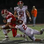 Luke Shoemaker (16) moves with the ball during a football game between Marysville Pilchuck and Stanwood at Marysville Pilchuck High School in Marysville, Washington on Friday, Sept. 8, 2023. Marysville Pilchuck takes the win, 36-7. (Annie Barker / The Herald)