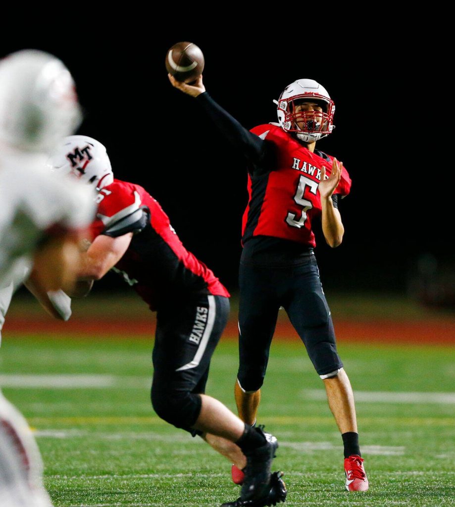 Mountlake Terrace senior quarterback Arian Motaghedi takes a shot downfield against Snohomish on Friday, Sept. 8, 2023, at Edmonds Stadium in Edmonds, Washington. (Ryan Berry / The Herald)