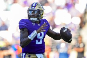 Washington quarterback Michael Penix Jr. looks to throw against Tulsa during the first half of an NCAA college football game Saturday, Sept. 9, 2023, in Seattle. (AP Photo/Lindsey Wasson)