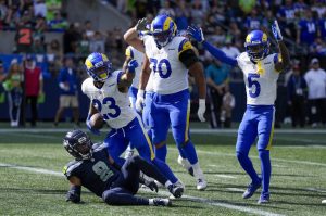 Los Angeles Rams running back Kyren Williams celebrates after scoring against the Seattle Seahawks during the second half of Sundays game Sunday in Seattle. (AP Photo/Stephen Brashear)