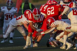 Marysville Pilchuck’s Kenai Sinaphet (21) moves with the ball during a football game between Marysville Pilchuck and Stanwood at Marysville Pilchuck High School in Marysville, Washington on Friday, Sept. 8, 2023. Marysville Pilchuck takes the win, 36-7. (Annie Barker / The Herald)
