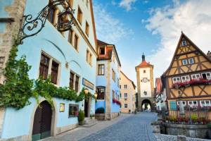 Picturesque Rothenburg, with its pastel buildings, uniform rooflines, and flower boxes, is also famous for its unique people.