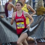 Snohomishs Paige Gerrard runs the first lap in the girls elite race at the Hole In The Wall Invitational on Oct. 8, 2022, in Arlington. (Olivia Vanni / The Herald)