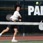 Edmonds-Woodway’s Nalu Akiona returns the ball against Snohomish on Wednesday, Sept. 13, 2023, at Snohomish High School in Snohomish, Washington. (Ryan Berry / The Herald)