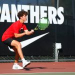 Snohomishs Cade Strickland sends a backhand back to his opponent against Edmonds-Woodway on Sept. 13 at Snohomish High School. (Ryan Berry / The Herald)