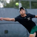 Jackson High’s Ben Lee lunges to get to the ball against Kamiak on Thursday, Sep. 22, 2022, at the Kamiak Tennis Courts in Mukilteo, Washington. (Ryan Berry / The Herald)