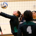 Jacksons London Redd bumps the ball back over her head and towards the net against Lynnwood during a volleyball match Thursday, Sept. 14, 2023, at Lynnwood High School in Bothell, Washington. (Ryan Berry / The Herald)