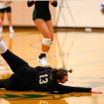 Lynnwoods Charlie Thomas nearly makes a diving save against Jackson during a volleyball match Thursday, Sept. 14, 2023, at Lynnwood High School in Bothell, Washington. (Ryan Berry / The Herald)