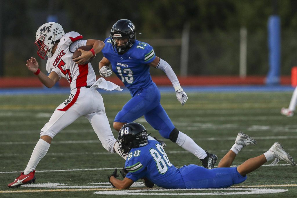 Mountlake Terraces Arian Motaghedi (5) runs with the ball during a football game between Mountlake Terrace and Shorewood at Shoreline Stadium in Shoreline, Washington on Friday, Sept. 15, 2023. Mountlake Terrace won, 35-0. (Annie Barker / The Herald)
