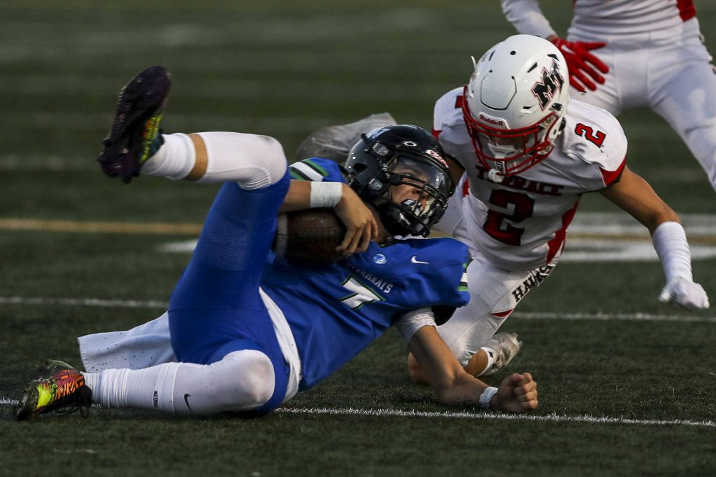 Shorewoods Tyler Giles (7) gets tackled during a football game between Mountlake Terrace and Shorewood at Shoreline Stadium in Shoreline, Washington on Friday, Sept. 15, 2023. Mountlake Terrace won, 35-0. (Annie Barker / The Herald)