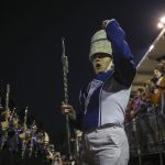A Shorewood drum major guides a performance during a football game between Mountlake Terrace and Shorewood at Shoreline Stadium in Shoreline, Washington on Friday, Sept. 15, 2023. Mountlake Terrace won, 35-0. (Annie Barker / The Herald)