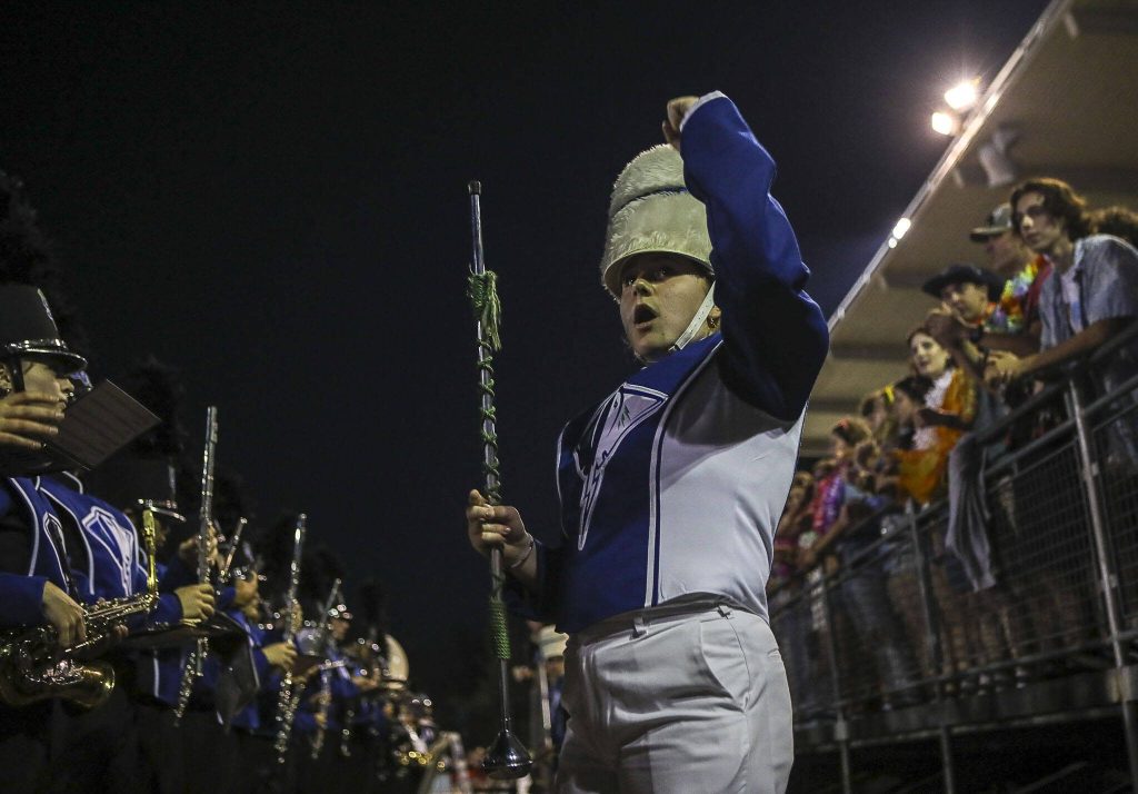 A Shorewood drum major guides a performance during a football game between Mountlake Terrace and Shorewood at Shoreline Stadium in Shoreline, Washington on Friday, Sept. 15, 2023. Mountlake Terrace won, 35-0. (Annie Barker / The Herald)
