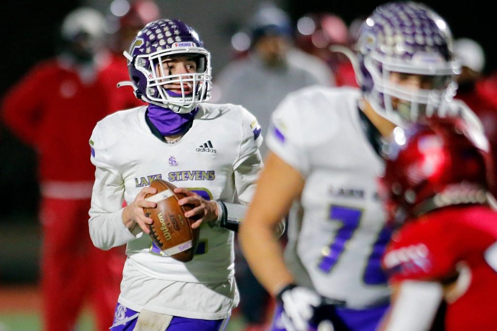 Lake Stevens quarterback Kolton Matson drops back to pass against Kennedy Catholic in the WIAA 4A State Football Championship game Saturday, Dec. 3, 2022, at Mount Tahoma Stadium in Tacoma, Washington. (Ryan Berry / The Herald)