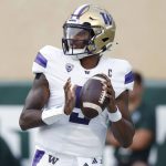 Washington quarterback Michael Penix Jr. looks to throw during the first half of an NCAA college football game against Michigan State, Saturday, Sept. 16, 2023, in East Lansing, Mich. (AP Photo/Al Goldis)