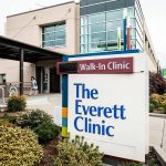 A person walks out of the Everett Clinic on Thursday, Sept. 7, 2023 in Everett, Washington. (Olivia Vanni / The Herald)