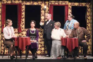 From left, Elora Coble, Carol Richmond, David Hayes, Karli Reinbold, Giovanna Cossalter Walters, Landon Whitbread in a scene from Edmonds Driftwood Players' production of "Murder on the Orient Express." (Dale Sutton / Magic Photography)