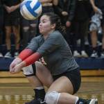 Stanwoods Katana Karasti digs the ball during the game against Arlington on Tuesday, Sept. 19, 2023 in Arlington, Washington. (Olivia Vanni / The Herald)
