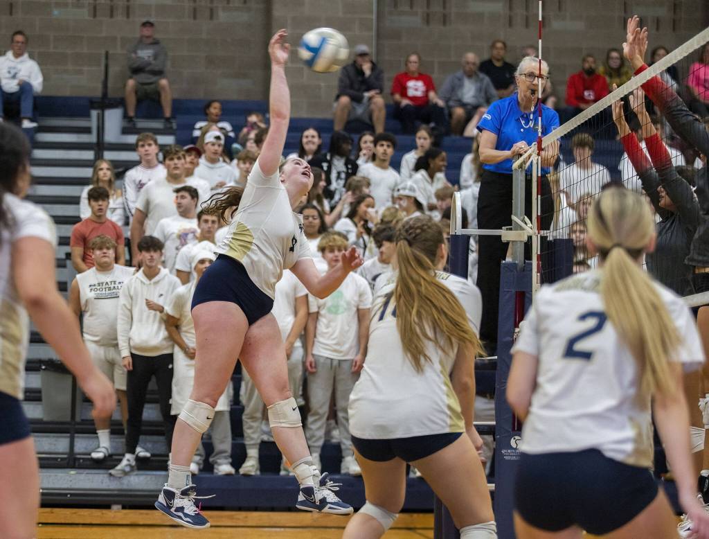 Arlingtons Melissa Hadley spikes the ball during the game against Arlington on Tuesday, Sept. 19, 2023 in Arlington, Washington. (Olivia Vanni / The Herald)