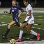 Glacier Peaks Sarah Stein (16) and Lake Stevens Noelani Tupua (18) fight for the ball during a girls soccer game between Glacier Peak and Lake Stevens at Glacier Peak High School in Snohomish, Washington on Thursday, Sept. 21, 2023. Lake Stevens won, 2-1. (Annie Barker / The Herald)
