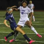 Glacier Peaks Ella Seelhoff (3) and Lake Stevens Noelani Tupua (18) fight for the ball during a girls soccer game between Glacier Peak and Lake Stevens at Glacier Peak High School in Snohomish, Washington on Thursday, Sept. 21, 2023. Lake Stevens won, 2-1. (Annie Barker / The Herald)