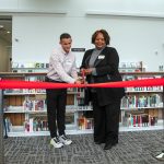 Student Vitalli Shvets and college President Dr. Chemene Crawford cut a ceremonial ribbon at the new Cascade Learning Center on Thursday, Sept. 28, 2023, at Everett Community College in Everett, Washington. (Ryan Berry / The Herald)