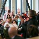A packed room listens as Everett Mayor Cassie Franklin speaks during the ribbon cutting ceremony of the new Cascade Learning Center on Thursday, Sept. 28, 2023, at Everett Community College in Everett, Washington. (Ryan Berry / The Herald)