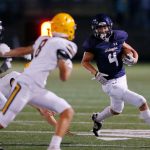 Arlingtons Jake Willis covers a lot of ground on a punt return against Ferndale on Friday, Sept. 22, 2023, at Arlington High School in Arlington, Washington. (Ryan Berry / The Herald)