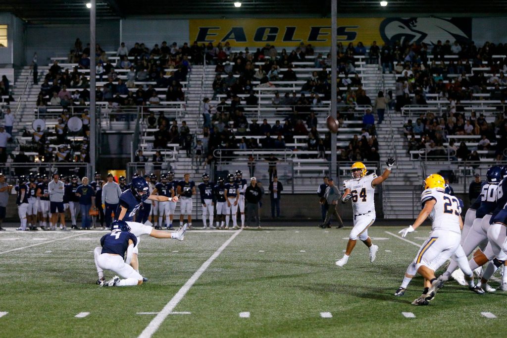 Arlington kicker Aidan Raney successfully kicks a field goal against Ferndale on Friday, Sept. 22, 2023, at Arlington High School in Arlington, Washington. (Ryan Berry / The Herald)