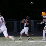 Arlington senior Stevie Balderas comes down with a catch against Ferndale on Friday, Sept. 22, 2023, at Arlington High School in Arlington, Washington. (Ryan Berry / The Herald)