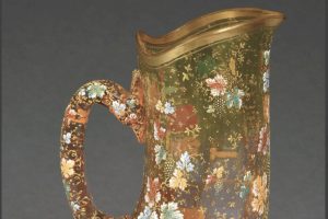 Do you prefer green or red grapes? This antique Moser pitcher is decorated with enameled grapevines on shaded red-to-green glass.