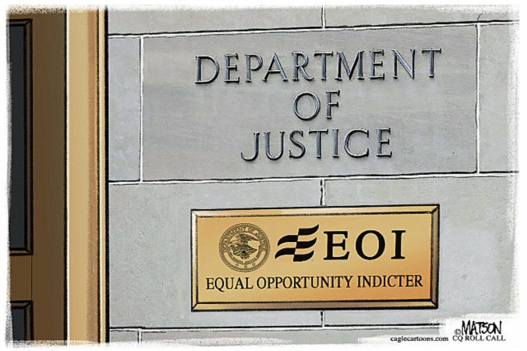 FILE PHOTO: Signage is seen at the headquarters of the United States Department of Justice (DOJ) in Washington, D.C., U.S., May 10, 2021. REUTERS/Andrew Kelly/File Photo