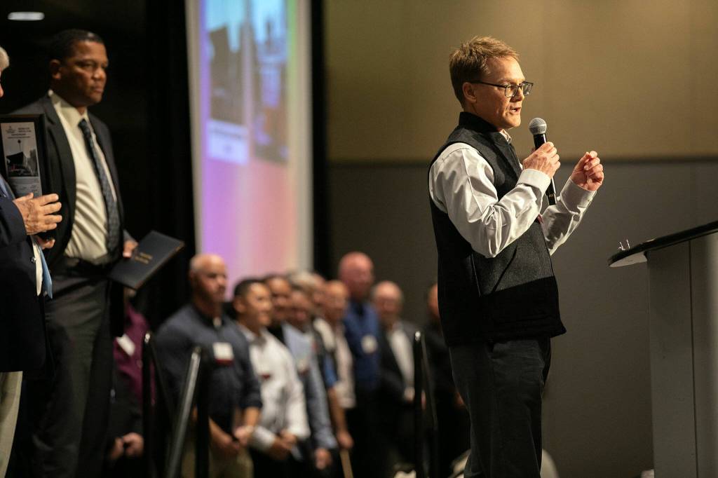The 1987 Cascade High School Boys Soccer Team is recognized during the 2023 Snohomish County Sports Hall of Fame Banquet on Wednesday, Sept. 27, 2023, at Angel of the Winds Arena in Everett, Washington. (Ryan Berry / The Herald)