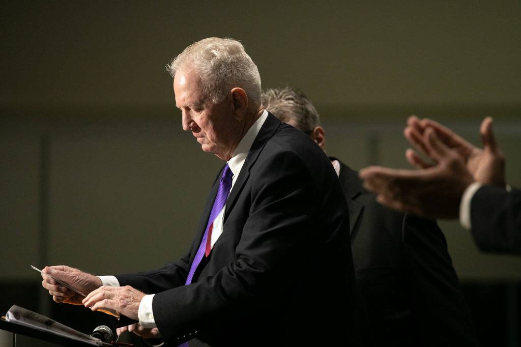Hall of Fame inductee Jim Ollom chokes up after accepting his honor during the 2023 Snohomish County Sports Hall of Fame Banquet on Wednesday, Sept. 27, 2023, at Angel of the Winds Arena in Everett, Washington. (Ryan Berry / The Herald)