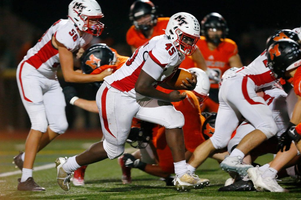 Mountlake Terrace senior Zaveon Jones  wearing a different number than usual  plows into the end zone for a second half touchdown in a loss to Monroe on Friday, Sept. 29, 2023, at Monroe High School in Monroe, Washington. (Ryan Berry / The Herald)