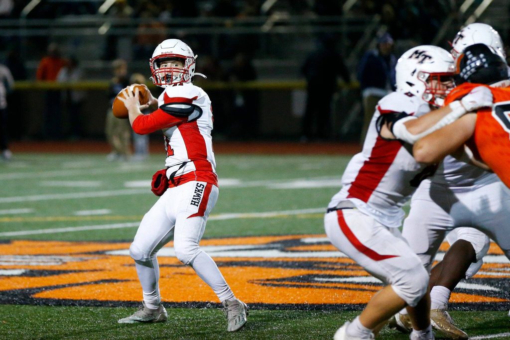 Mountlake Terrace quarterback Matthew Meadows makes a short completion against Monroe on Friday, Sept. 29, 2023, at Monroe High School in Monroe, Washington. (Ryan Berry / The Herald)