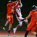 Monroes Deegan Chapman (6) comes down with an interception on a 50/50 ball against Mountlake Terrace on Friday, Sept. 29, 2023, at Monroe High School in Monroe, Washington. (Ryan Berry / The Herald)