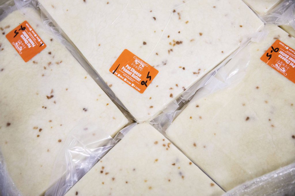 Blocks of locally sourced cheese used in a selection of Himalayan Dog Chews on Thursday, Sept. 21, 2023 in Arlington, Washington. (Olivia Vanni / The Herald)