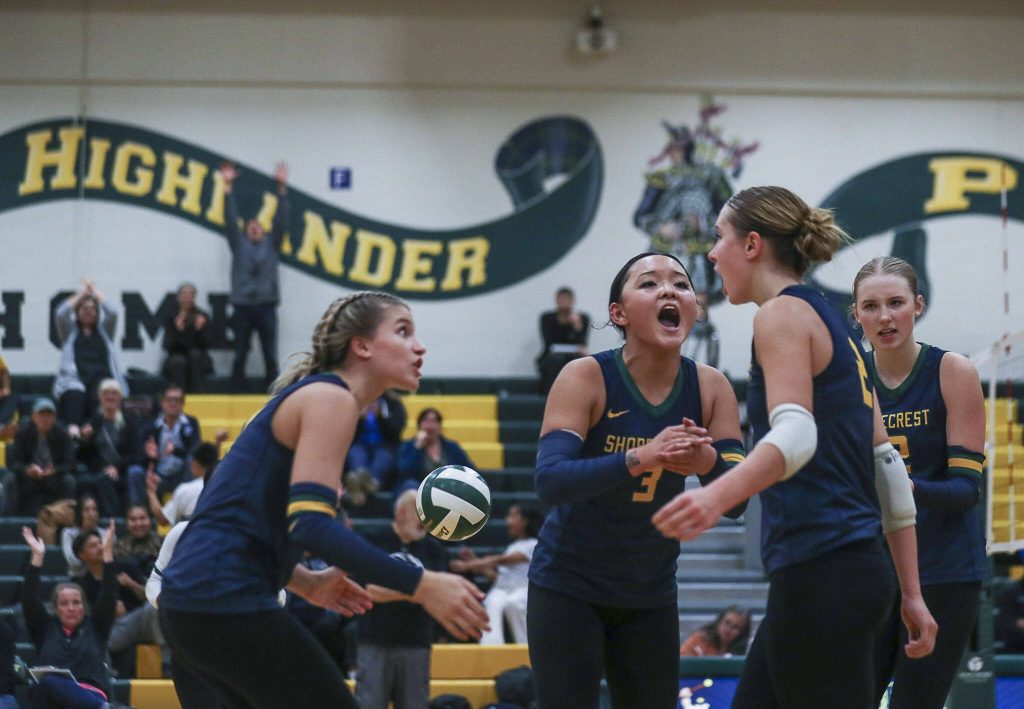 Shorecrest players celebrate during a volleyball game between Lynnwood and Shorecrest at Shorecrest High School in Shoreline, Washington on Tuesday, Oct. 3, 2023. Lynnwood took the win. (Annie Barker / The Herald)