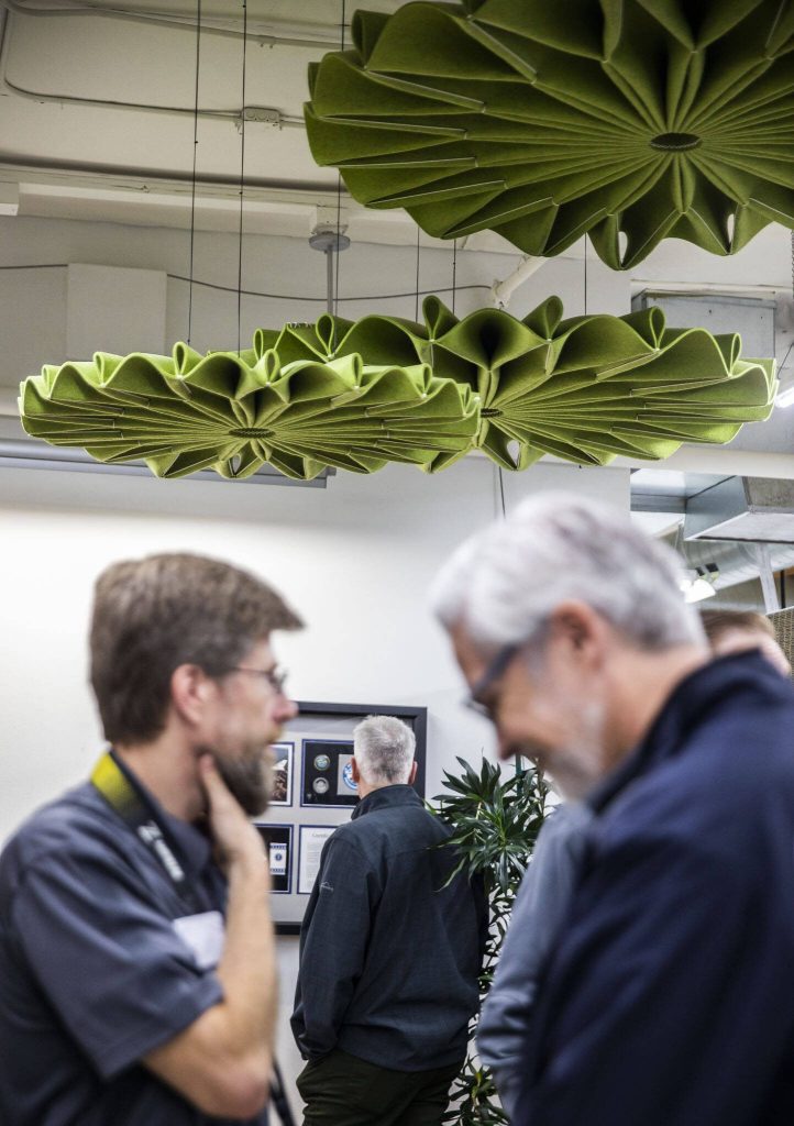 BuzziPleat Edel Acoustic Decorative Suspended Sculpture hangs from the ceiling at Kaas Tailored where it is manufactured on Tuesday, Oct. 10, 2023 in Mukilteo, Washington. (Olivia Vanni / The Herald)