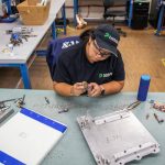 Dominique Gonzalez works at Pathfinder Manufacturing on Tuesday, Oct. 10, 2023 in Everett, Washington. (Olivia Vanni / The Herald)