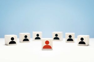 Human resources, recruitment and management concept with people icons on wooden blocks