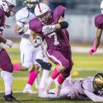 Cascades Zach Lopez breaks free of a tackle during the game against Everett on Friday, Oct. 6, 2023 in Everett, Washington. (Olivia Vanni / The Herald)