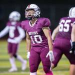 Cascades Devyn Chan cheers after the defense gets a stop during the game against Everett on Friday, Oct. 6, 2023 in Everett, Washington. (Olivia Vanni / The Herald)