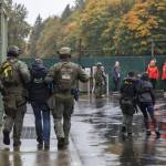 Police and SWAT team help victims out of a building during a mass casualty training on Wednesday, Oct. 11, 2023 in Snohomish, Washington. (Olivia Vanni / The Herald)