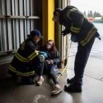 Snohomish firefighters tend to a wounded victim during a mass casualty training on Wednesday, Oct. 11, 2023 in Snohomish, Washington. (Olivia Vanni / The Herald)