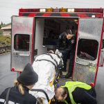 A victim is loaded into an ambulance for transport to a hospital during a mass casualty training on Wednesday, Oct. 11, 2023 in Snohomish, Washington. (Olivia Vanni / The Herald)